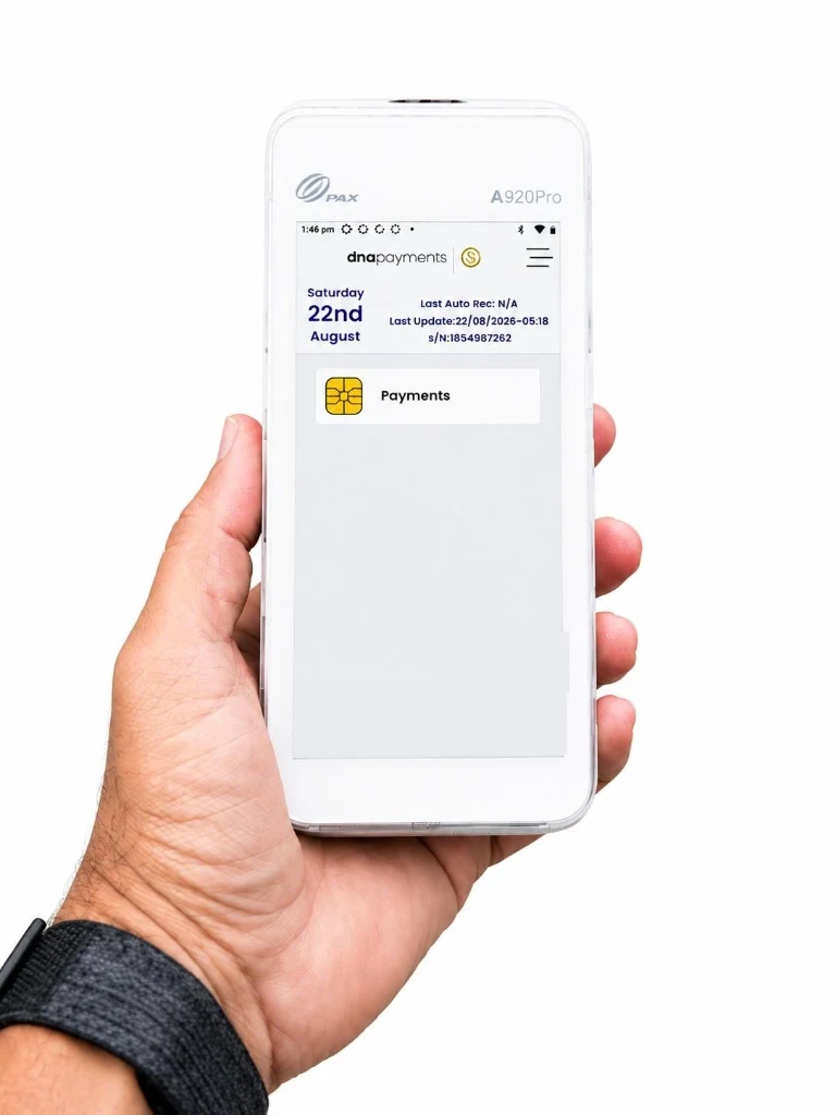 Zivaro A920Pro card machine held in one hand, ready to take a contactless payment